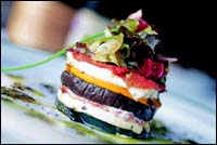 Mille feuille of tomato and eggplant confit... with zucchini, buffalo milk, mozzarella and fresh basil. To accompany the Moet & Chandon Brut Imperial Rose.
