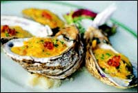 Hot oysters... with fresh fennel and saffron nage, salmon caviar. To accompany the Moet & Chandon Brut Imperial.