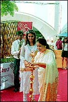 Chief Guest Asha Bhosle, a restaurateur and fine cook herself, inaugurates The UpperCrust Show with magazine editor Farzana Contractor.