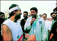 With cricket great Kapil Dev, who was one of the celebrity guests at the Marathon. In India, 99.9 per cent people follow cricket, said Anil Ambani.