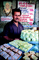Mukesh Parshottam Thakar in his tiny shop which is a giant among sweetmeat makers just because of the popularity of its Ghari.