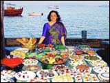 Swati Piramal at the food table on the Haveli of the Sea Horse.