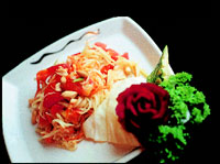 Som Tam Spicy Thai Raw Papaya 
Salad.