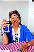 And happy, cheerful Dolly with her glass of wine.