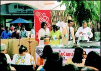 Jafferbhai Mansuri of Delhi Darbar, 
a Mughlai cuisine expert, demonstrates how to make Mutton Biryani with the help of his sons Mazhar and Moin and daughter Rizwana.