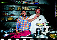 Lachko, which is hot Khaman served with sev, and with a chutney made of green chillies and onion. Bharatbhai and Vinodbhai Thakkar serve it with hot groundnut oil.