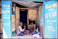 Sohanlal Saroya and his son at work in A. G. R. Varqwallah.
