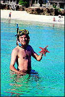 And a diver comes up with a starfish.